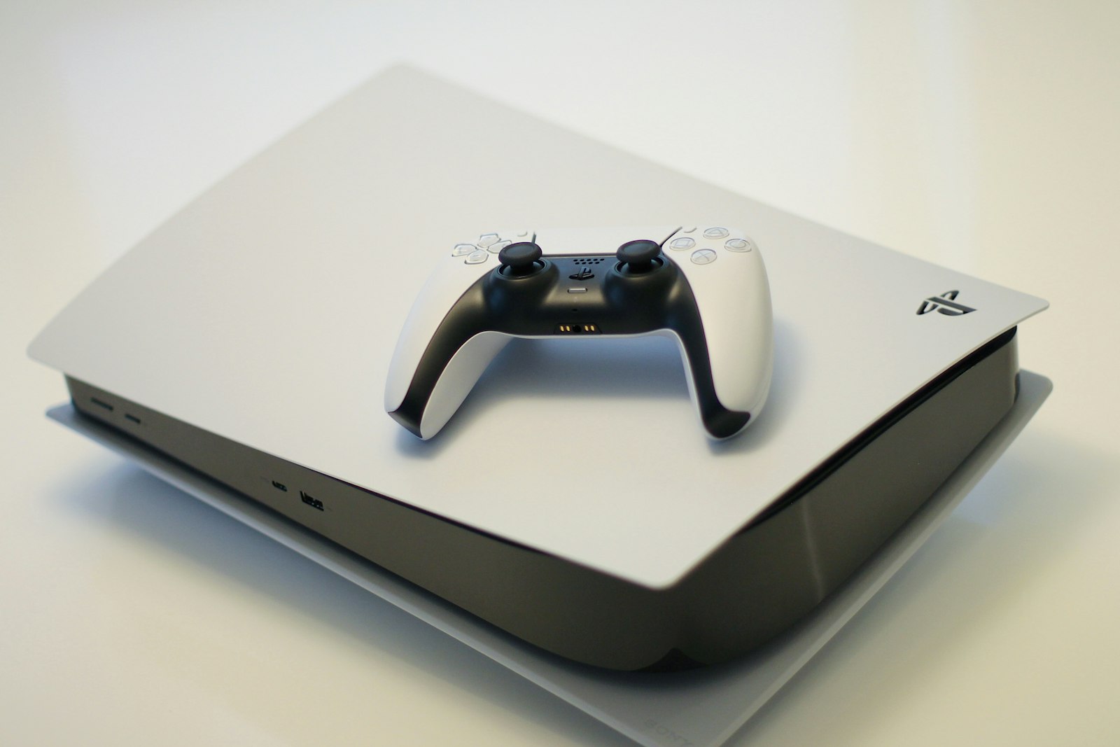 PlayStation 5 console with DualSense controller — Everything Electronic LLC fixes PS5, Xbox, Nintendo Switch